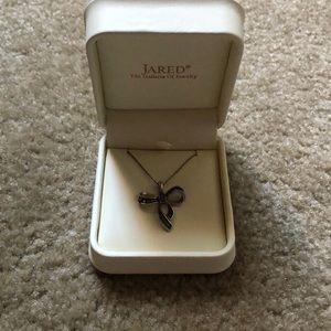 Good Cond Purple Bow Jared Necklace.
